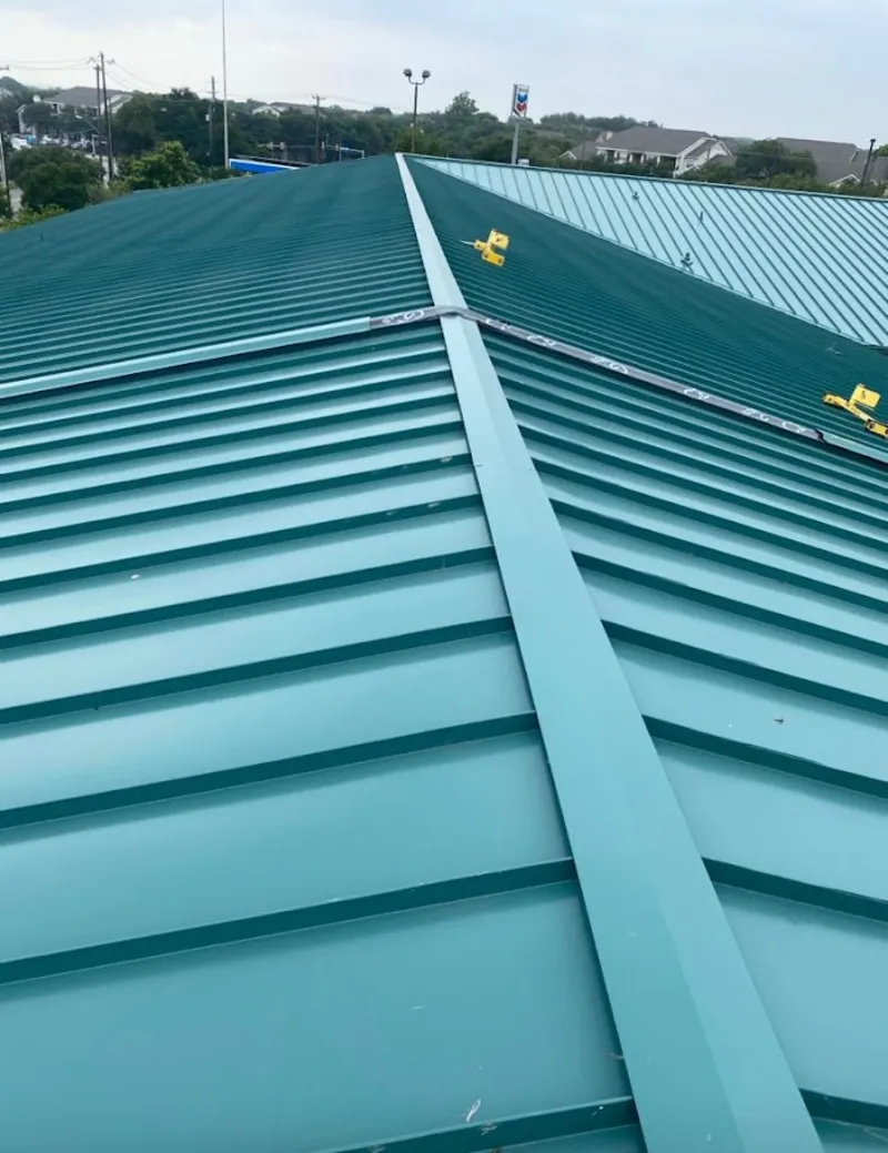 Green commercial metal roof ridge and valley for Metal Roof Repair in Home Gardens